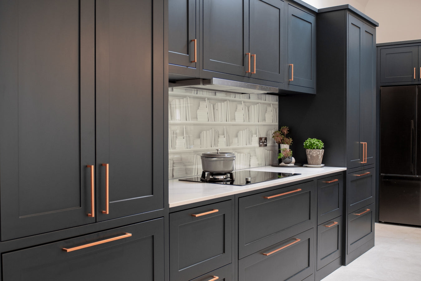 Modern kitchen with classic shaker cabinets and white quartz worktop