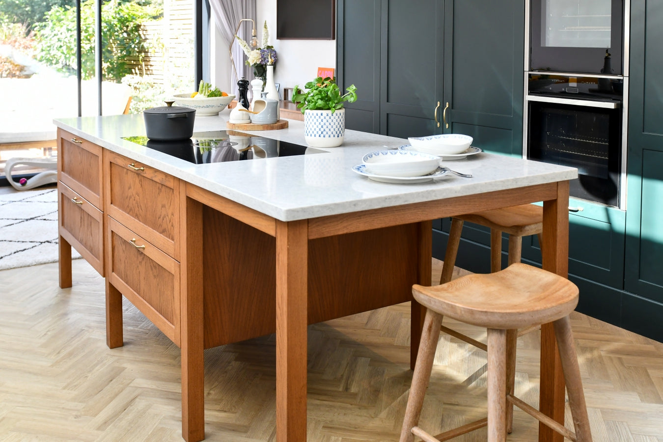 Modern kitchen with stained oak island and stools